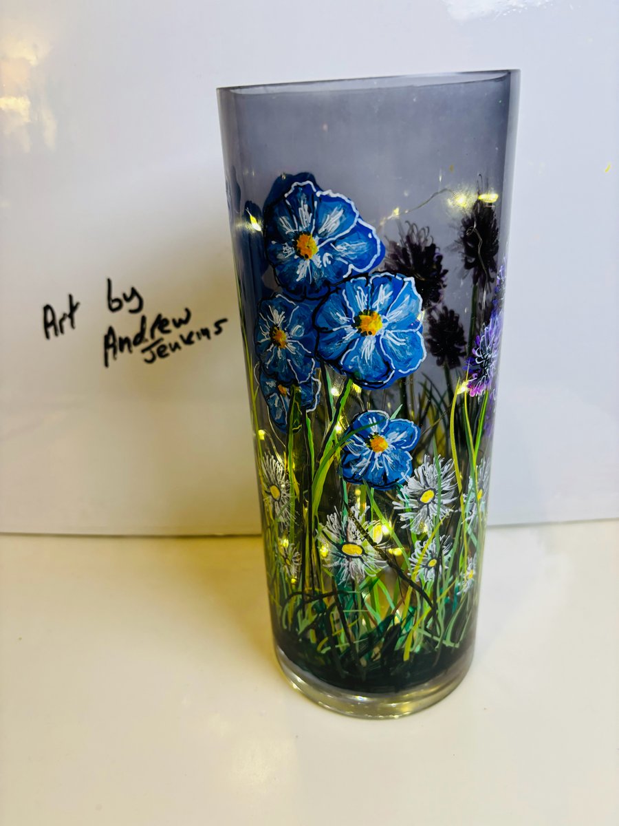 A hand painted and fired glass vase by Andrew Jenkins