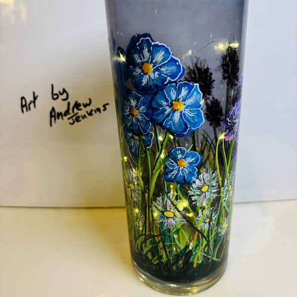 A hand painted and fired glass vase by Andrew Jenkins