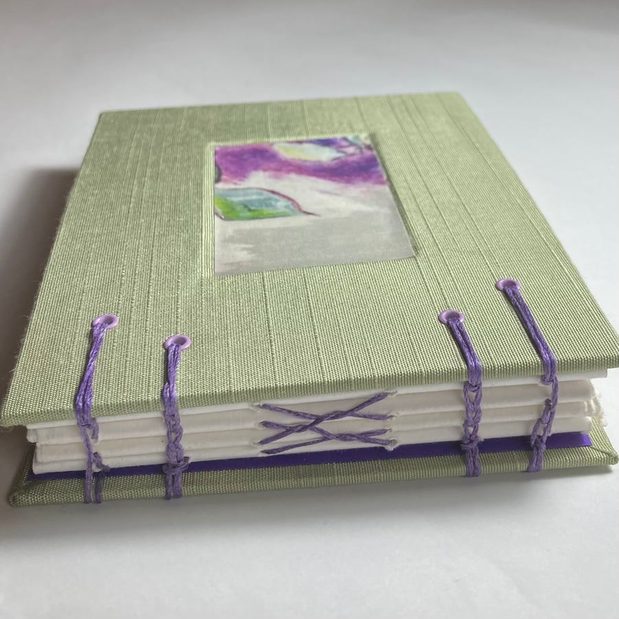 A Handstitched Book in Soft Greens & Purples