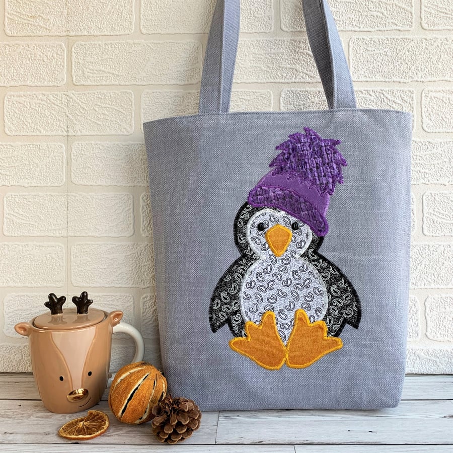 Penguin tote bag in pale blue with a paisley pe. Folksy