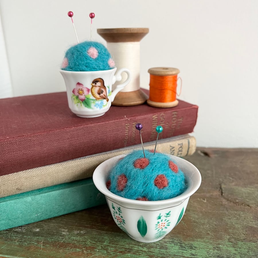 Pair of pincushions in repurposed pots with needle felted cushion
