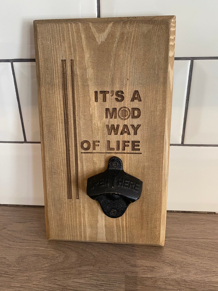 Wall mounted bottle opener 