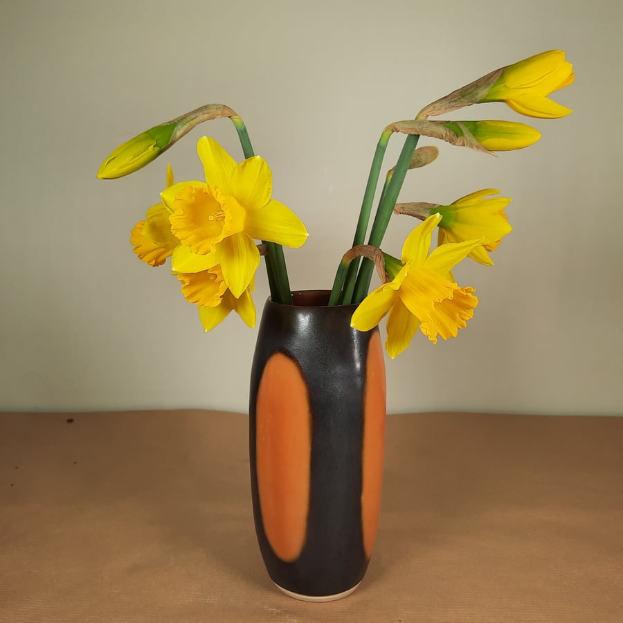 Burnt orange and nearly black hand thrown ceramic vase