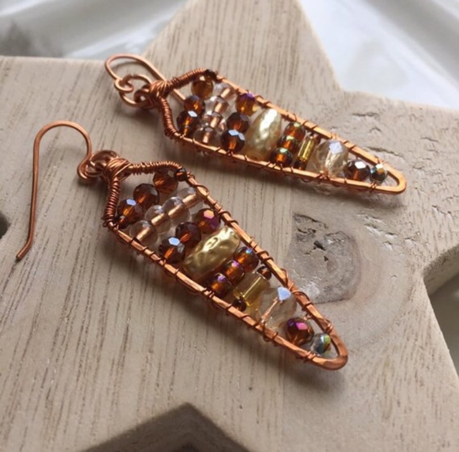 Brown beaded wire wrapped copper earrings