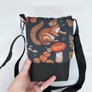 Mini cross body bag with squirrel and mushroom print on waterproof canvas.