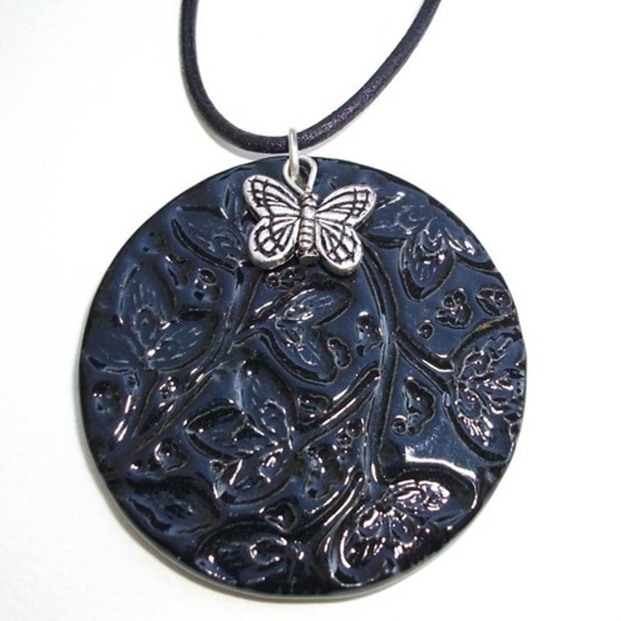 black ceramic pendant with butterfly