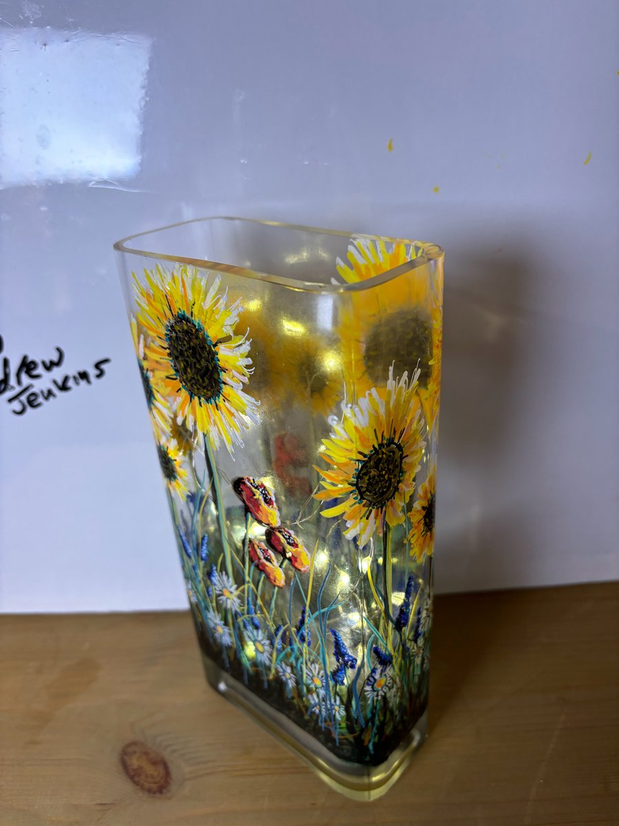 A hand painted and fired glass vase by Andrew Jenkins 