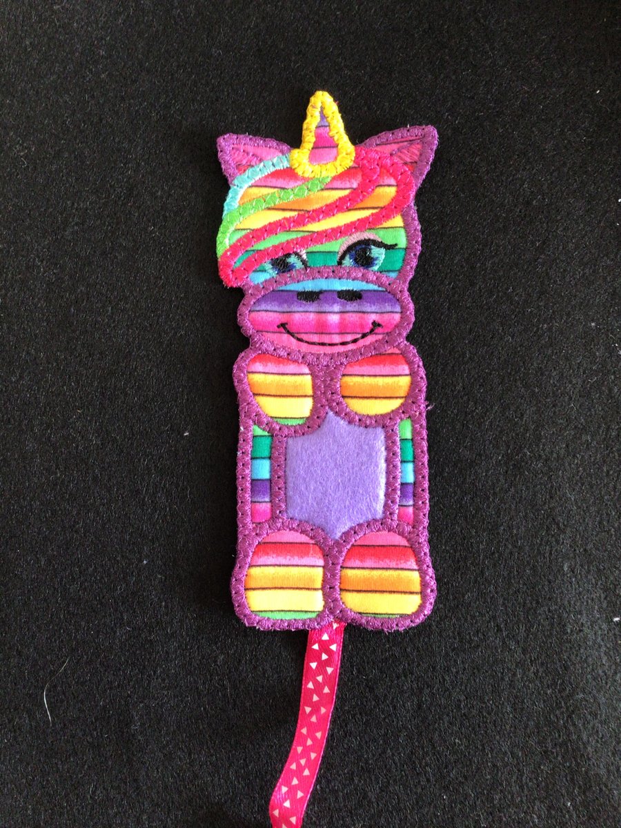 Unicorn bookmark, rainbow and plum.