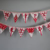 'Happy Birthday' bunting in shades of red and cream