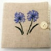  Sewing needle case with hand embroidered flowers.