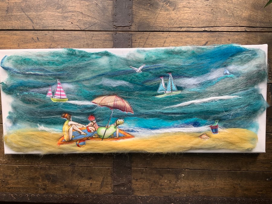 Art. Seaside with Appliqué beach ladies. . Wet Felted art on canvas. 20” by 8” 