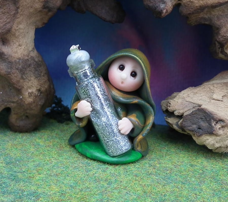 Tiny Gnome 'Farly' the Forager with glass vial faerie dust  Ann Galvin