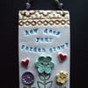 Ceramic How does your garden grow? wall plaque folksygardeners