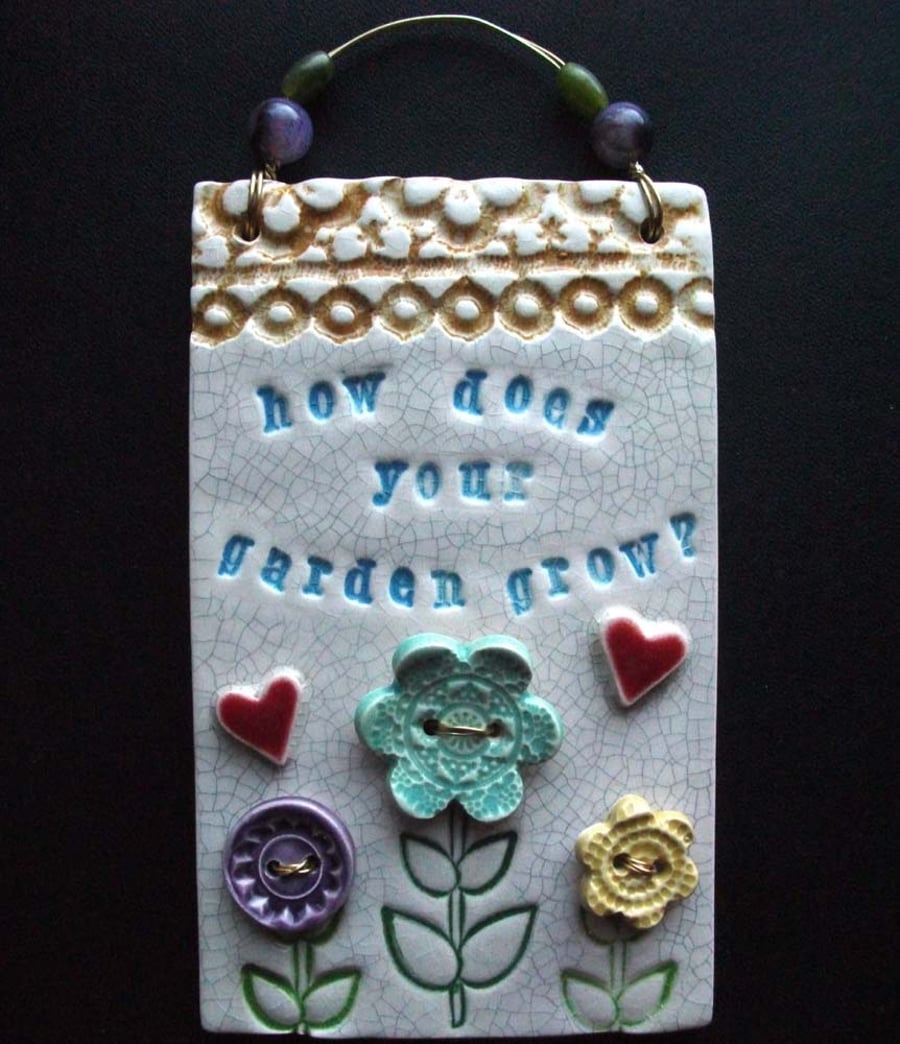 Ceramic How does your garden grow? wall plaque folksygardeners