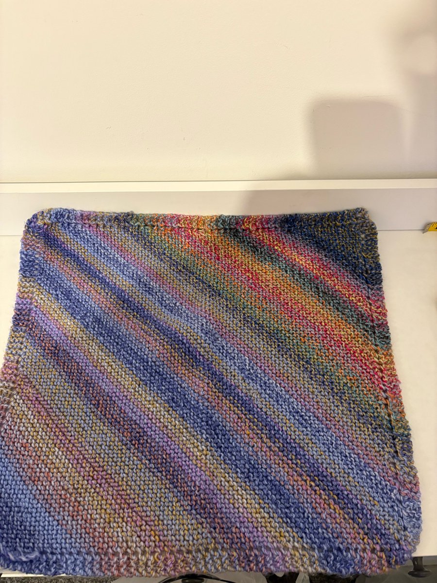 Hand knitted baby blanket. 
