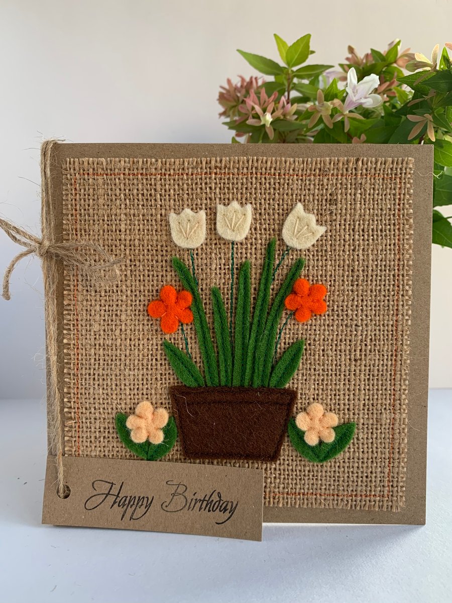 Handmade Birthday Card. A pot of orange and cream flowers from wool felt.