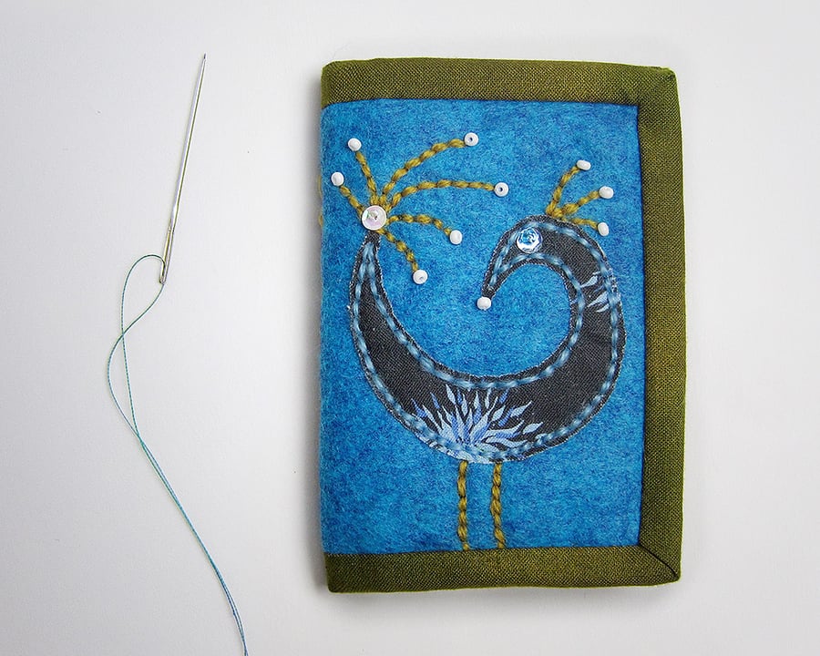 Needle case with appliquéd bird