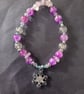 Elasticated beaded winter bracelet with crystal chip and silver snowflake charm  - Image 3