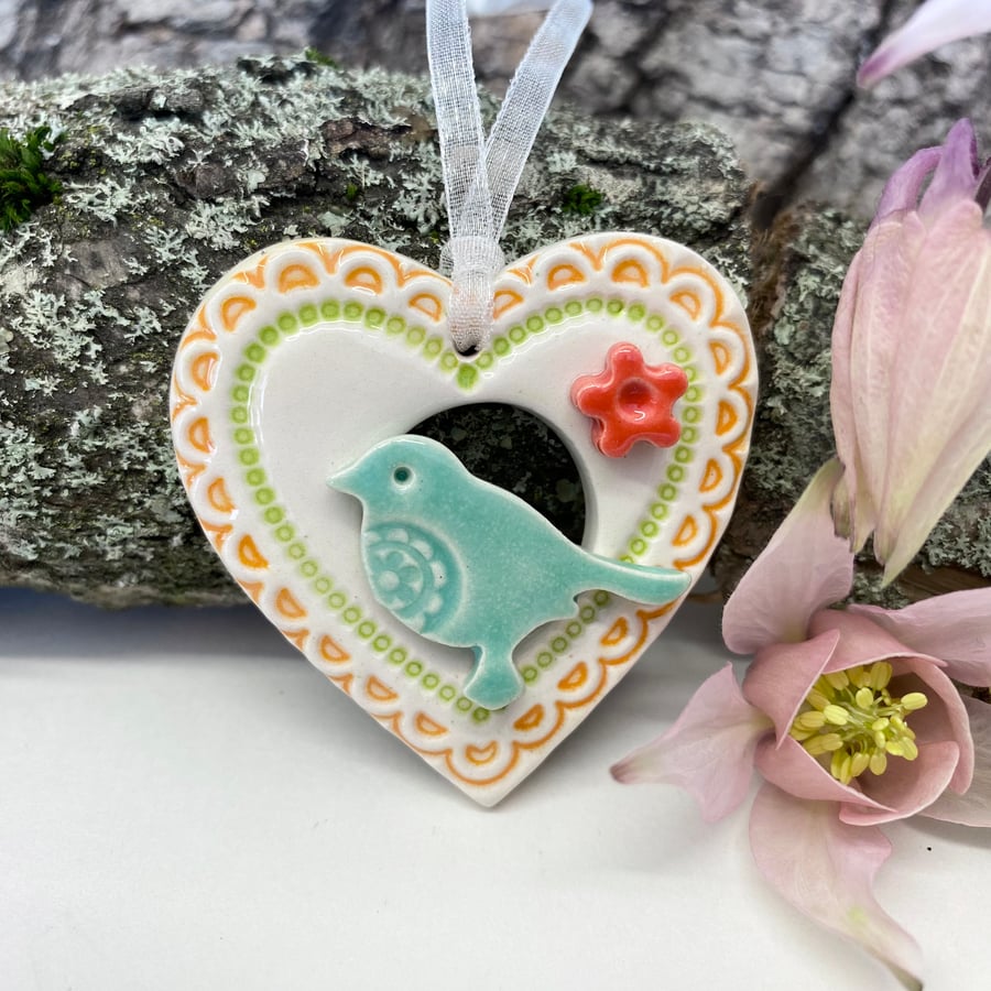 Small Ceramic bird in a heart decoration turquoise pottery bird