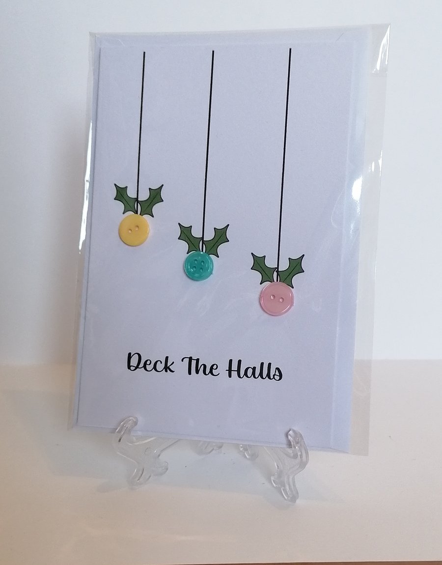 Christmas card with buttons saying Deck the Halls 