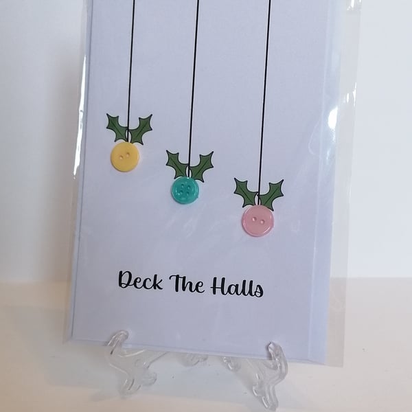 Christmas card with buttons saying Deck the Halls 