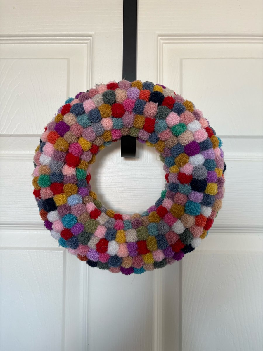 Wool Pom Poms brights wreath. 
