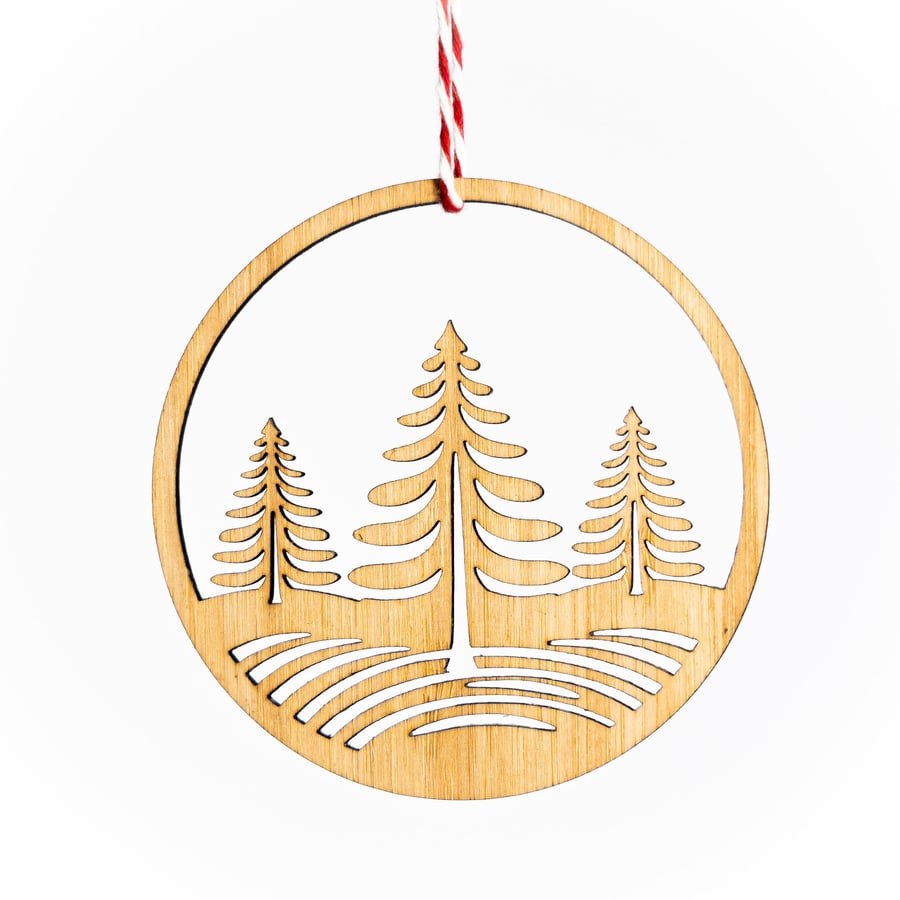 Snowy Trees Christmas Ornament. Sustainable bamboo decoration to hang in a tree.