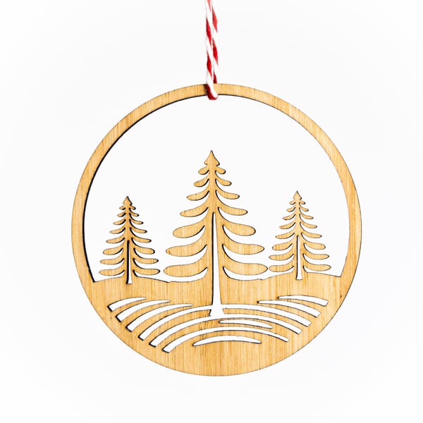 Snowy Trees Christmas Ornament. Sustainable bamboo decoration to hang in a tree.