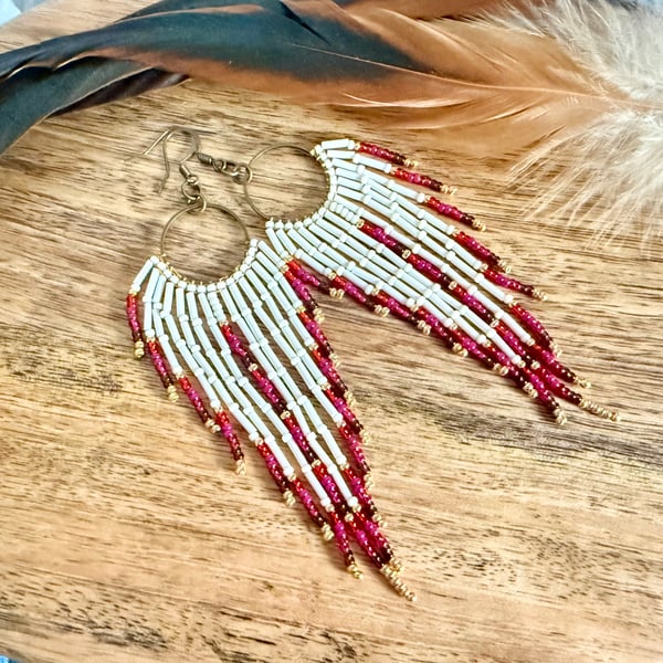 Cream and pink beadwork fringe earrings on bronze hoops