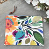 Bright floral linen zip pouch with teal twill back and leopard print lining