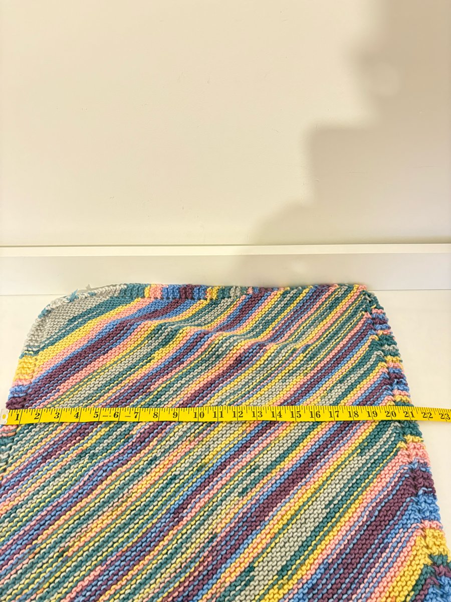 Hand knitted baby blanket. 