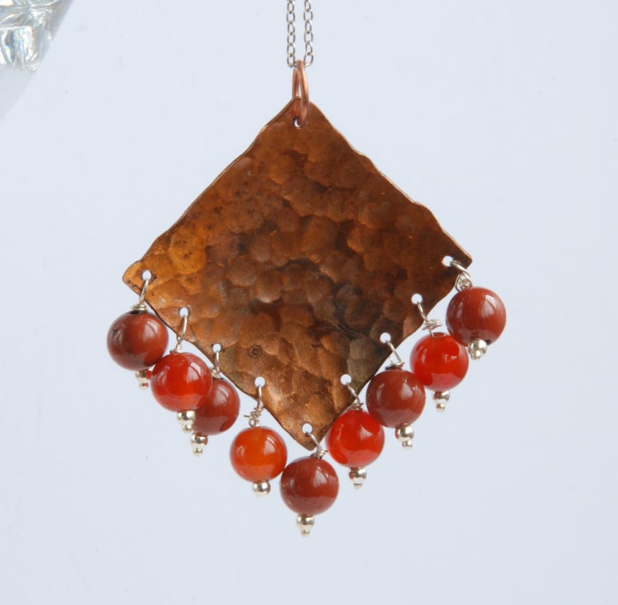 Large fringed copper pendant with silver chain (orange brown)