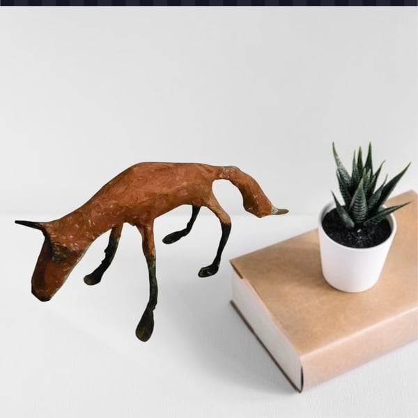Handmade paper mache fox sculpture