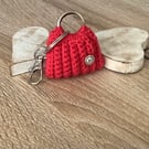 Small bag key, ear buds, coins holder