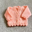 Peach baby cardigan hand knitted lacy pattern newborn 