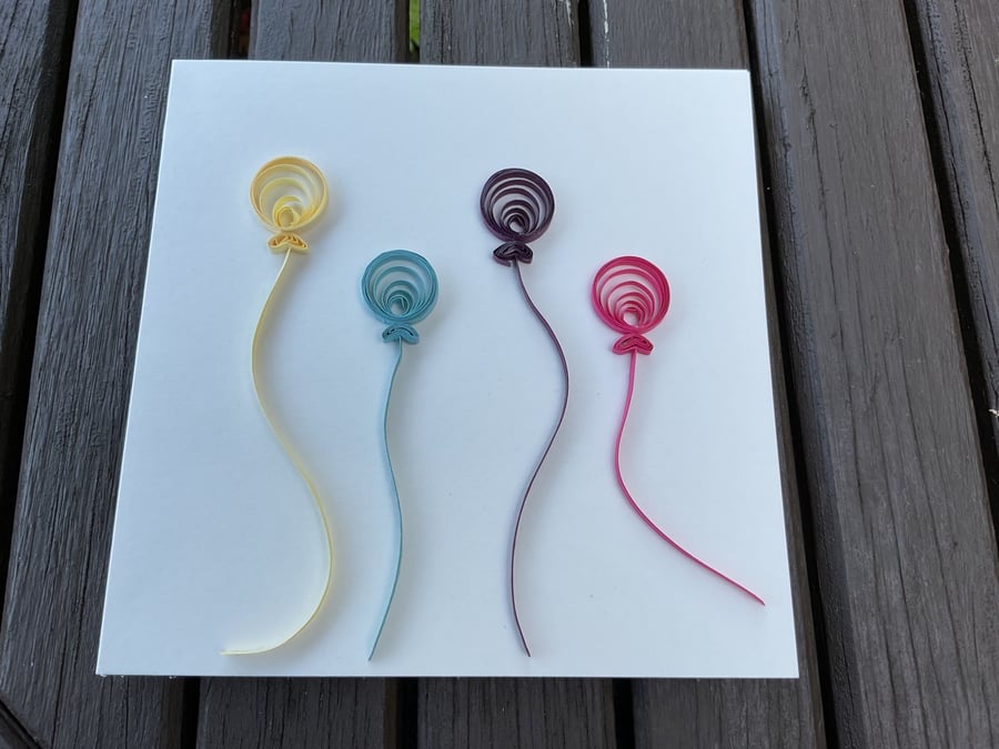 Four Quilled Balloons on a Ivory Greetings Card
