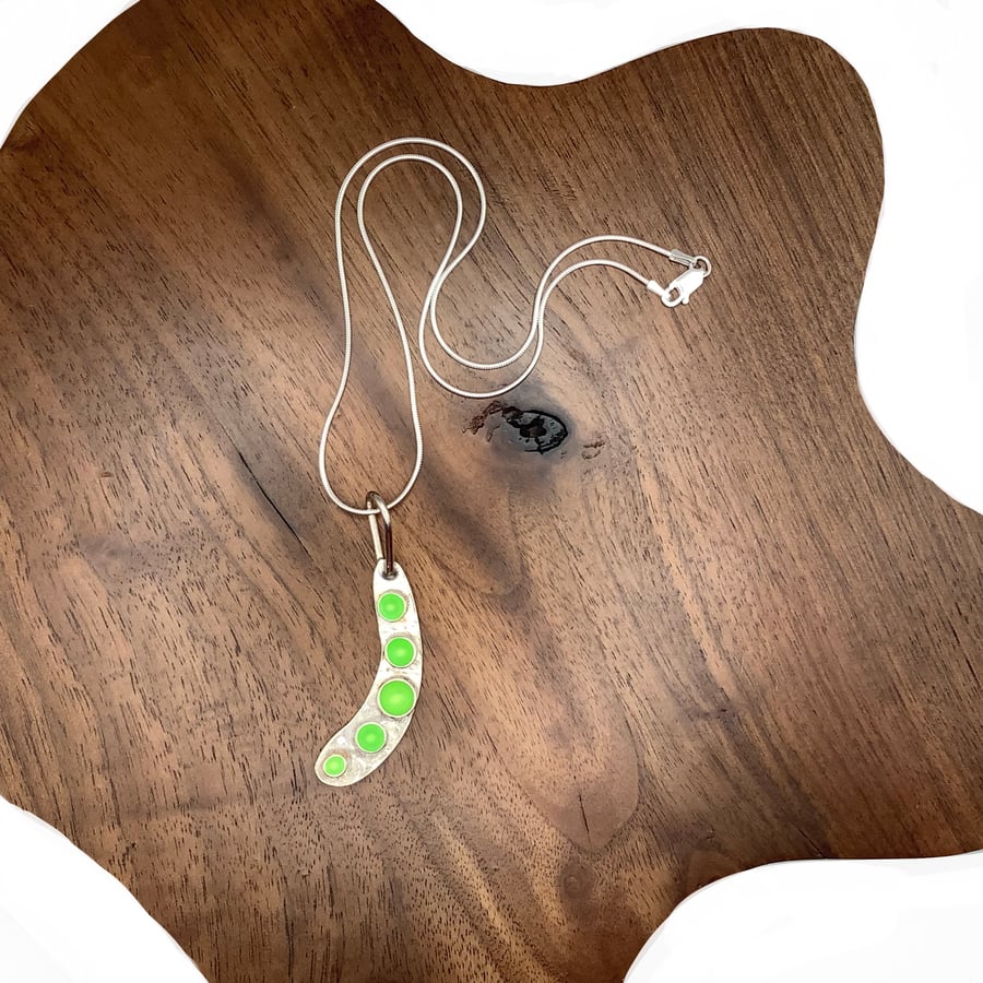 Sterling silver and florescent green enamel pea pod pendant