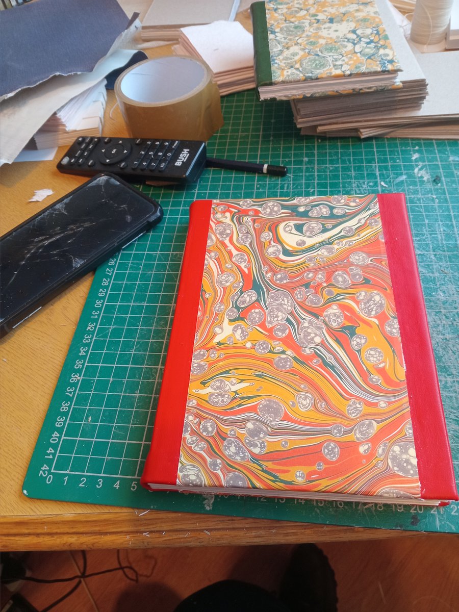 Red Journal, A5 tree-free hemp paper,  printed marbled and leather cover.