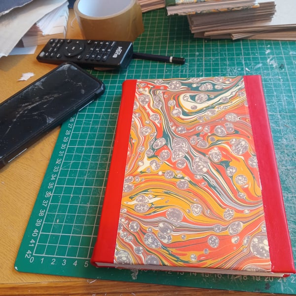 Red Journal, A5 tree-free hemp paper,  printed marbled and leather cover.