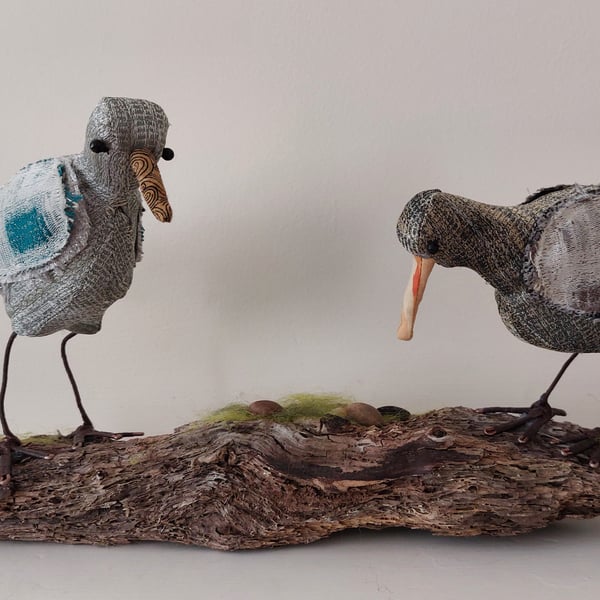 Small waders on driftwood sculpture ornament decoration 