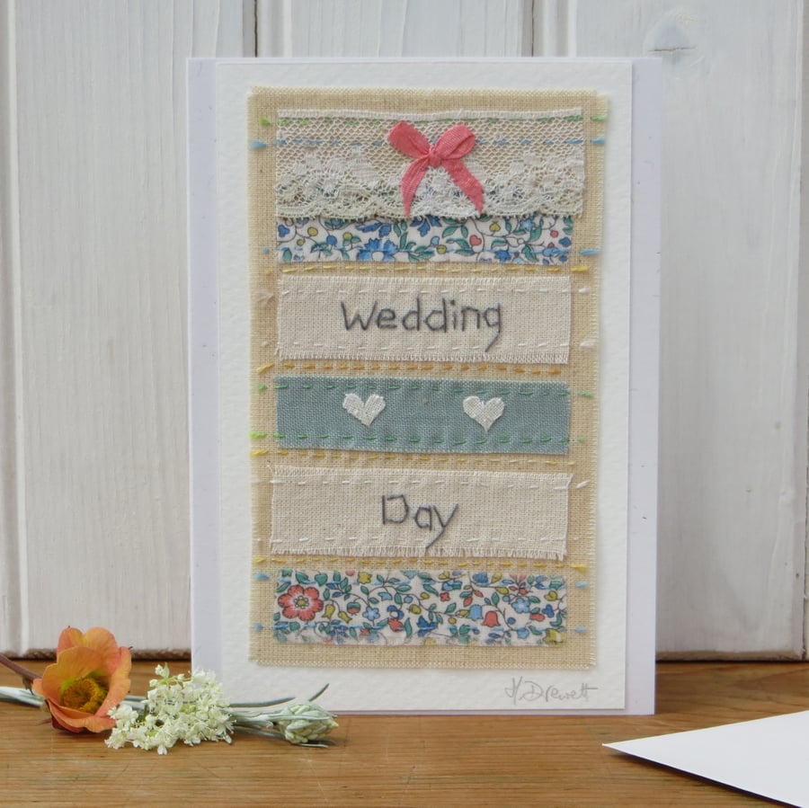 Hand-stitched, pretty little card with applique hearts and Liberty fabric
