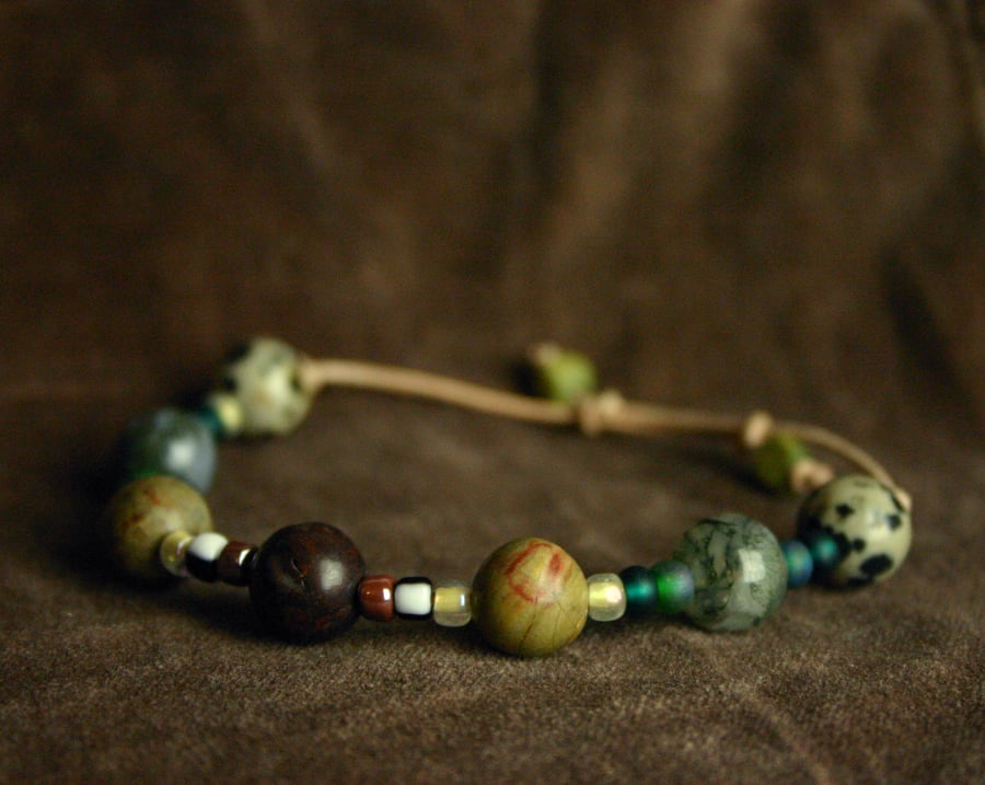 Stone bead bracelet on leather thong