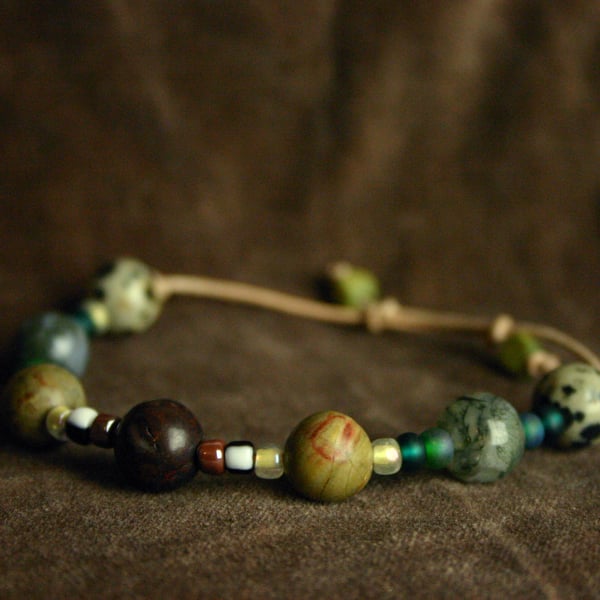 Stone bead bracelet on leather thong