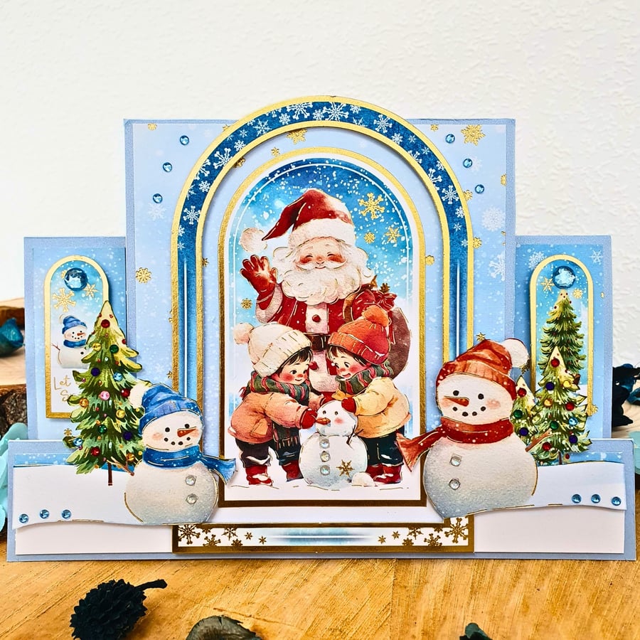 Christmas Card With Father Christmas, Kids Making A Snowman, & Christmas Trees