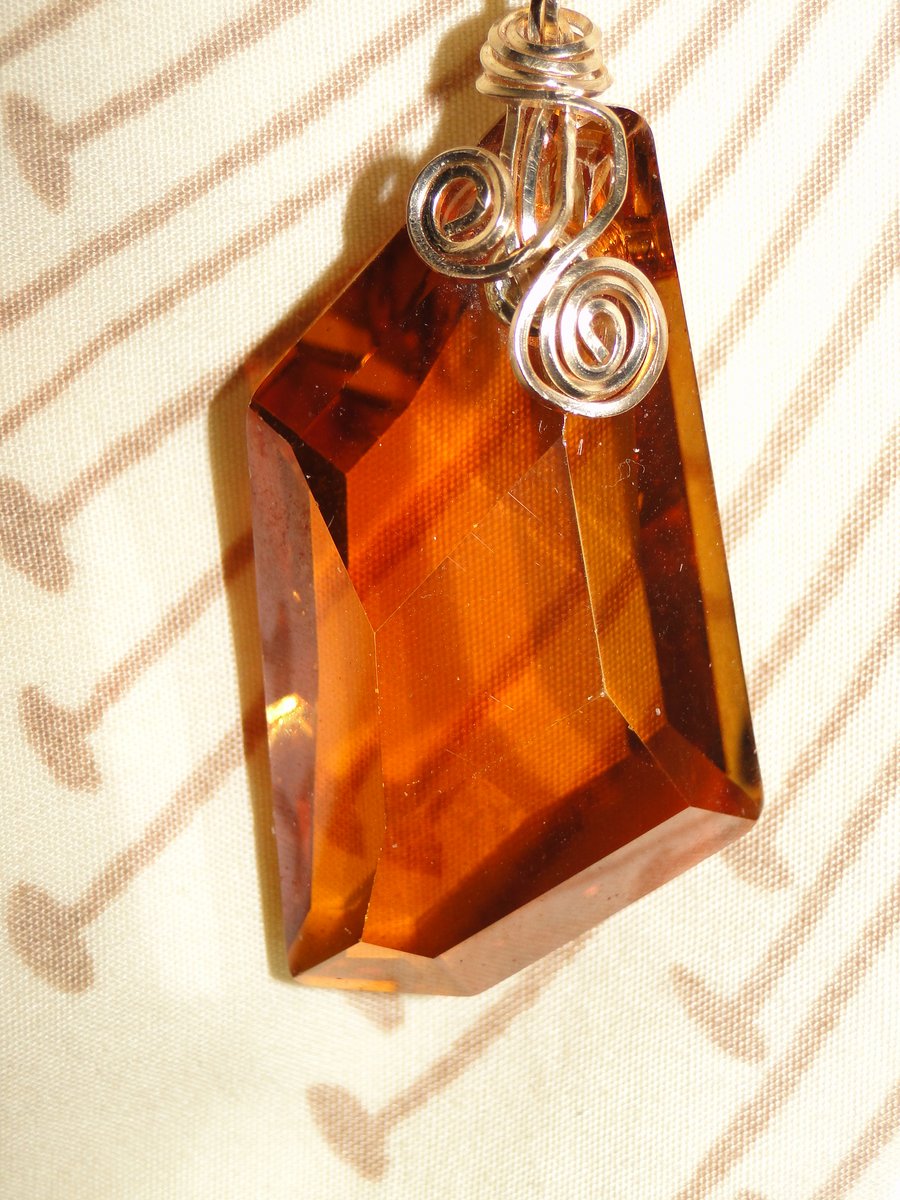 Wire wrapped copper coloured Swarovski Crystal Pendant on a gold chain Rare