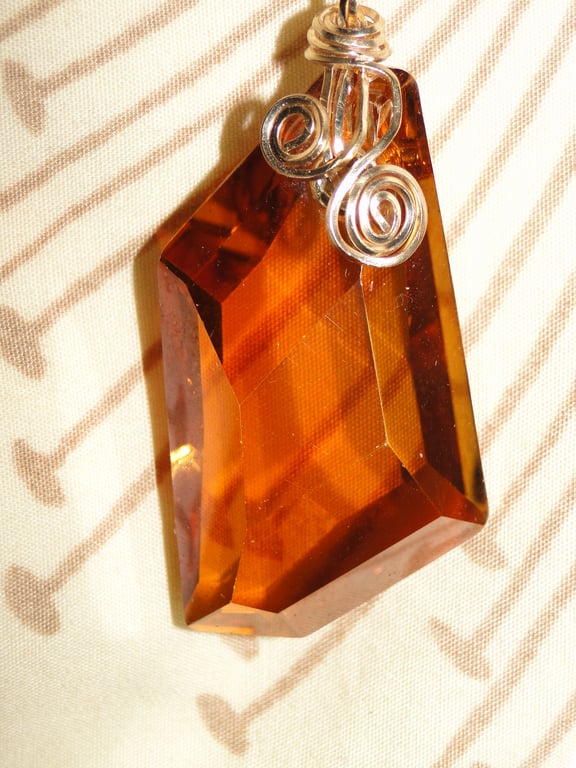 Wire wrapped copper coloured Swarovski Crystal Pendant on a gold chain Rare