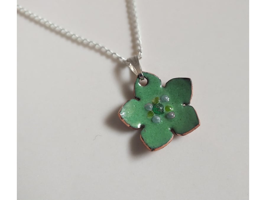 Green enamel flower pendant
