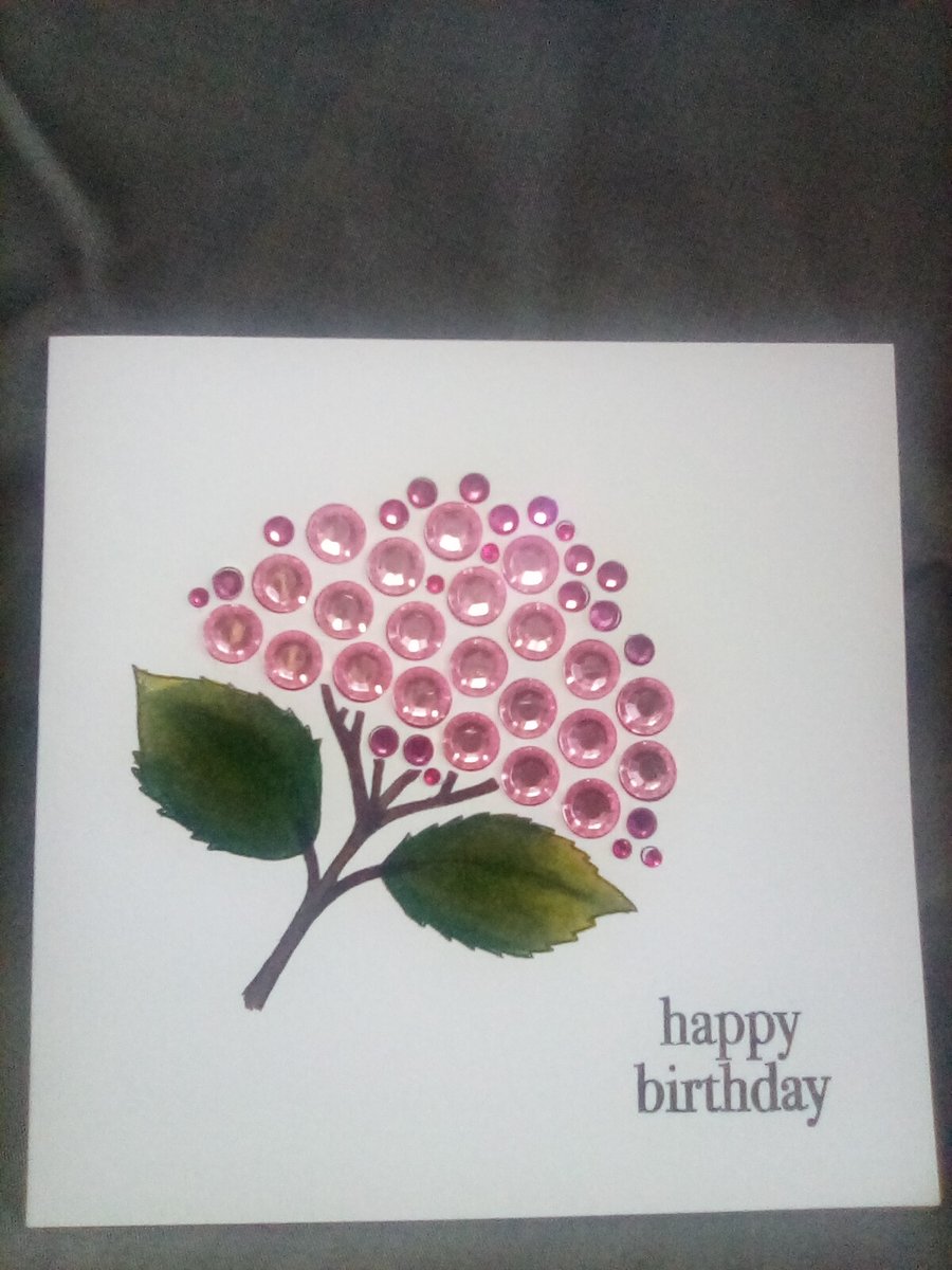 A beautiful watercolour hand  embellished handmade Birthday card