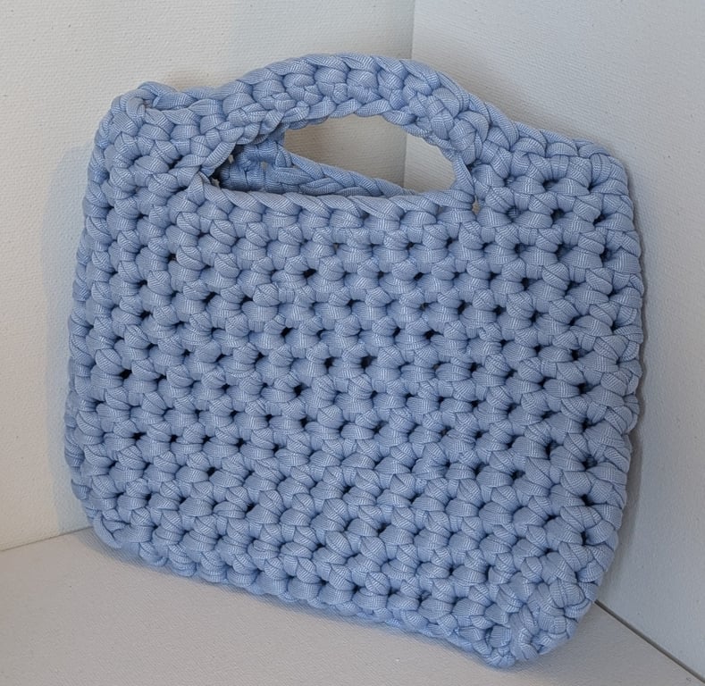 Handmade crochet bag made with light blue t-shirt yarn 