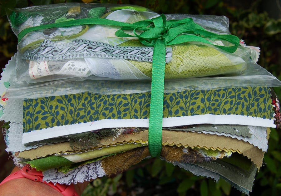 Upcycled slow stitching kit includes fabric, buttons, thread, lace, ribbon